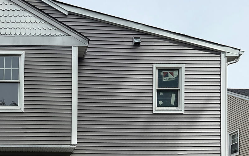Photo of a new addition recently added by Everest Construction Group to a New Jersey home with gray vinyl siding